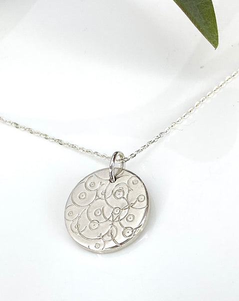 Abstract breastfeeding design necklace