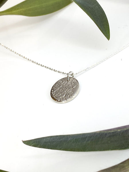 Abstract breastfeeding design necklace