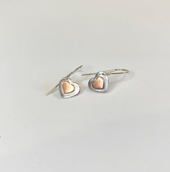 Double heart earrings - copper on silver